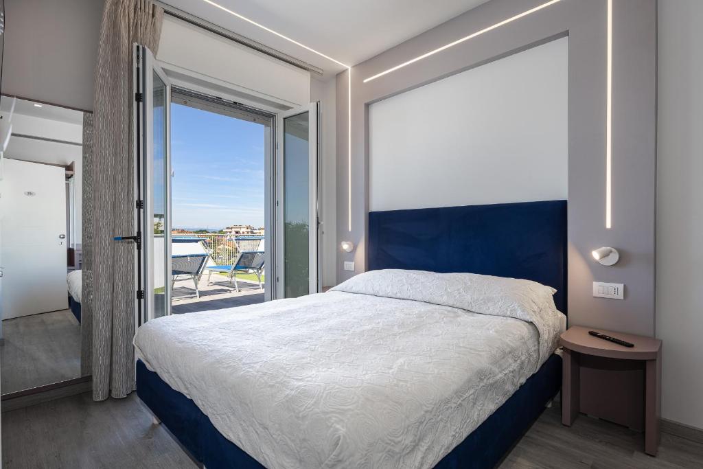 Postel nebo postele na pokoji v ubytování Hotel Niagara