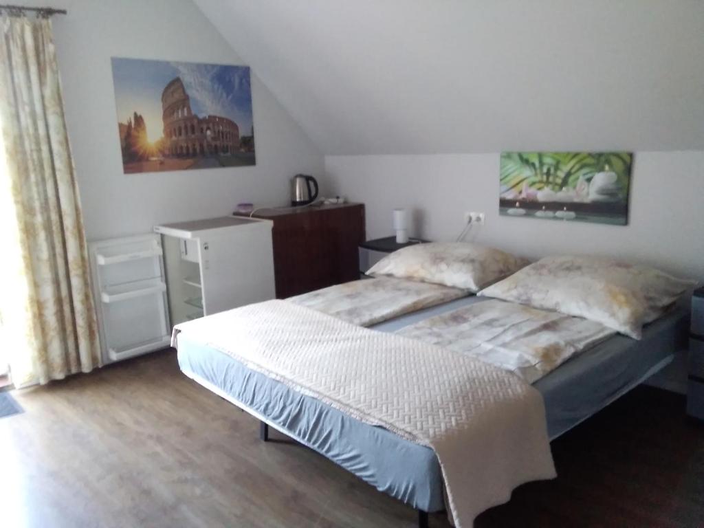 Postel nebo postele na pokoji v ubytování Pokoje Morska
