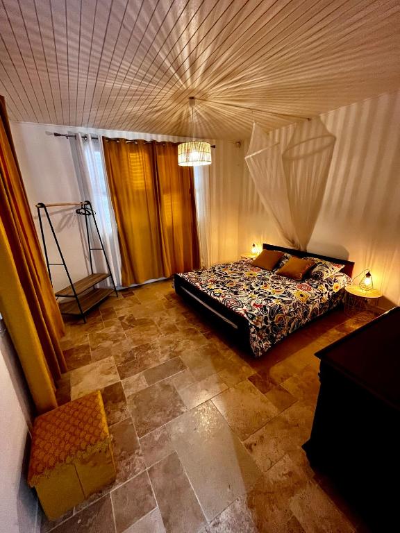 Postel nebo postele na pokoji v ubytování Villa PAULINE