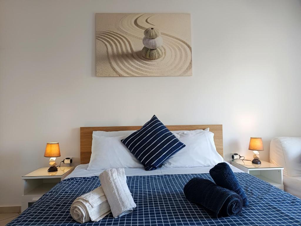 Postel nebo postele na pokoji v ubytování CozyCoast
