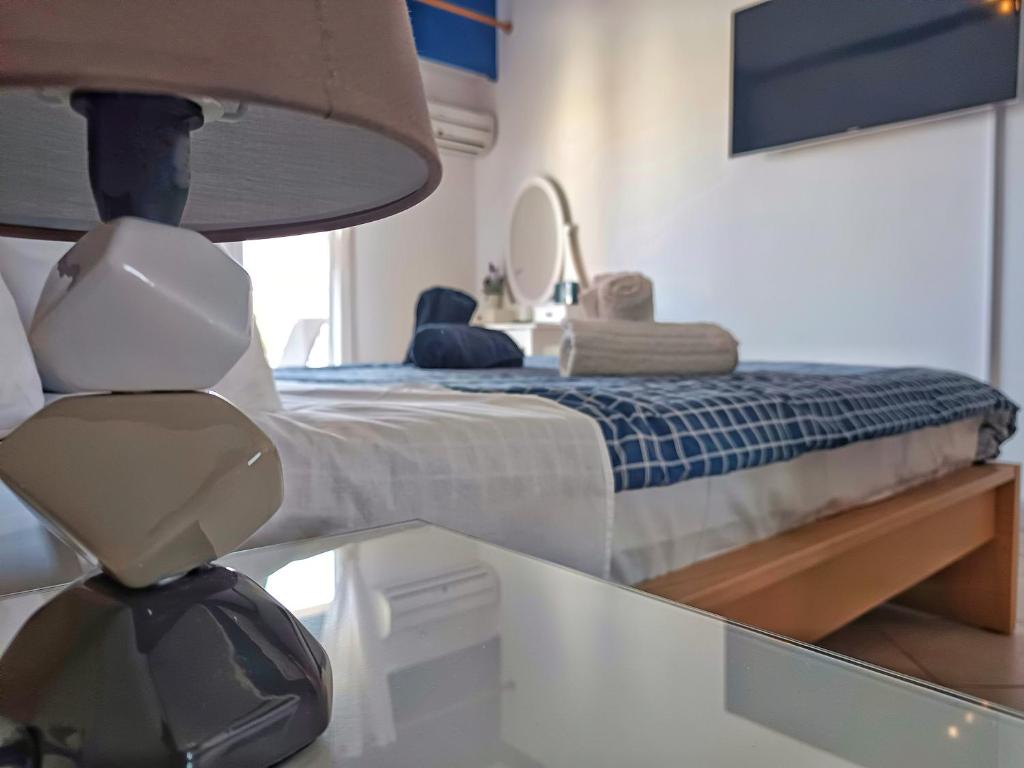 Postel nebo postele na pokoji v ubytování CozyCoast