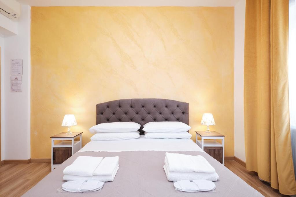 Letto o letti in una camera di Il Pontefice Luxury