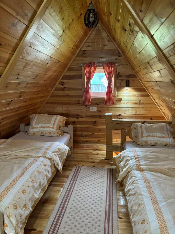 Postel nebo postele na pokoji v ubytování Apartman Jegdic-Zabljak