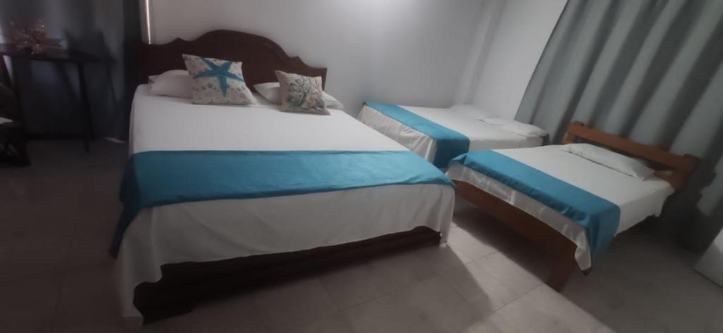 Letto o letti in una camera di Sarie Bay Inn