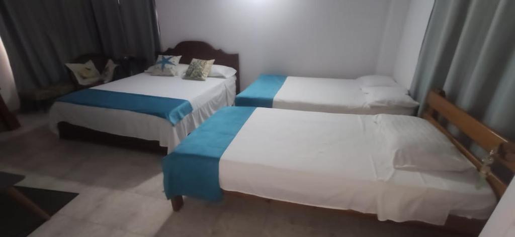 Letto o letti in una camera di Sarie Bay Inn
