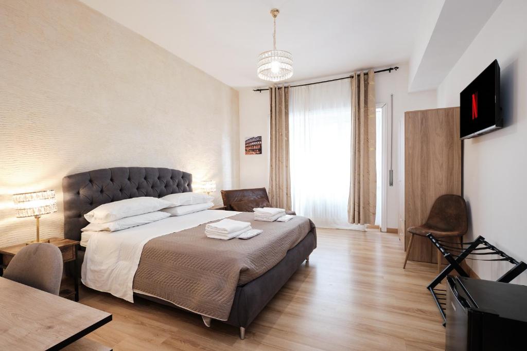 Letto o letti in una camera di Il Pontefice Luxury