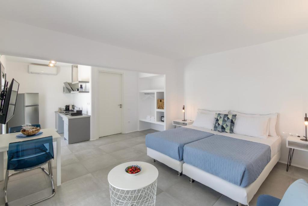 Postel nebo postele na pokoji v ubytování Alexander Suites
