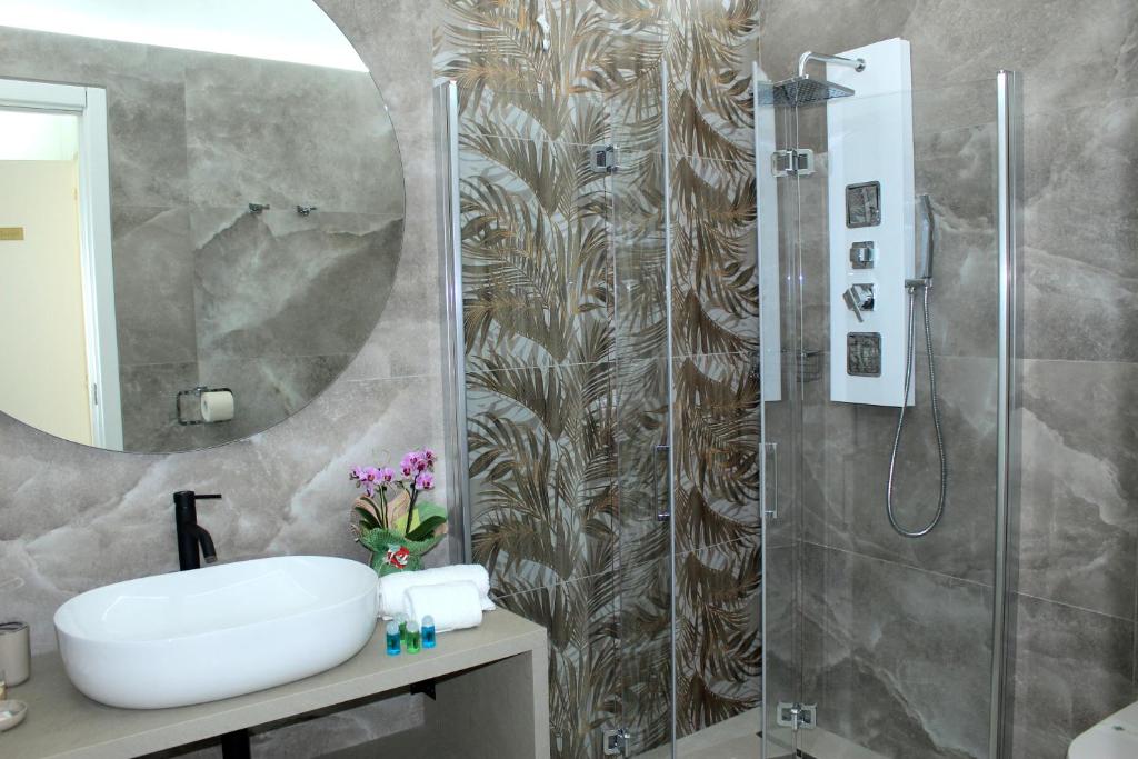 a bathroom with a sink and a shower at Tenuta Paifer in Otranto
