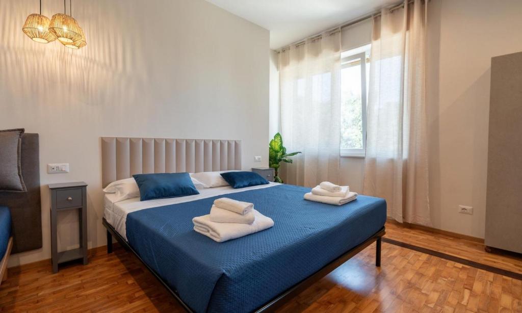 Postel nebo postele na pokoji v ubytování Namuri Comfortable Rooms