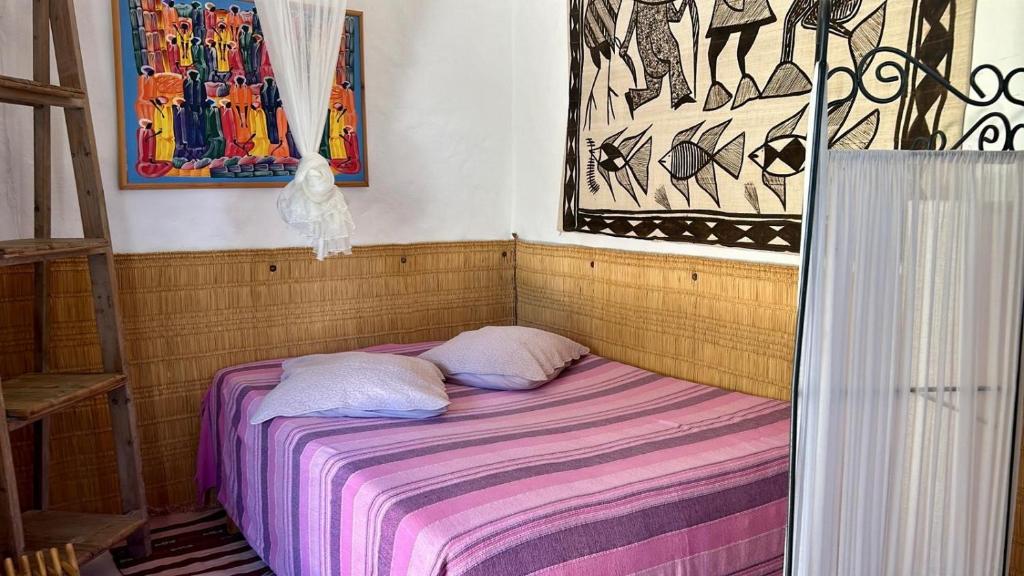 Postel nebo postele na pokoji v ubytování Doukana