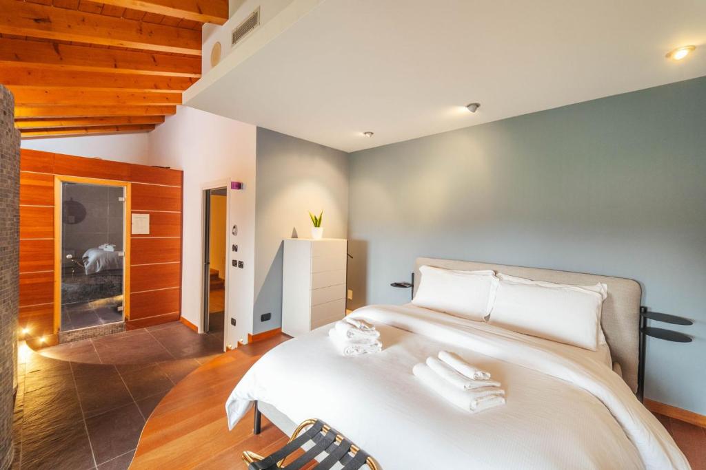 Łóżko lub łóżka w pokoju w obiekcie B&B Podere Dell'Angelo