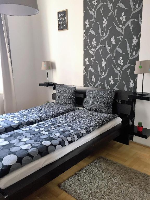 Posteľ alebo postele v izbe v ubytovaní Gozsdu Apartment