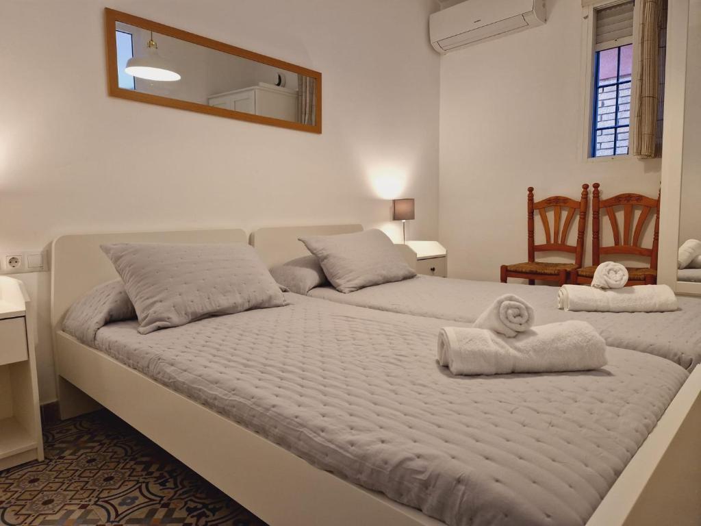 Posteľ alebo postele v izbe v ubytovaní Beachfront Apartment