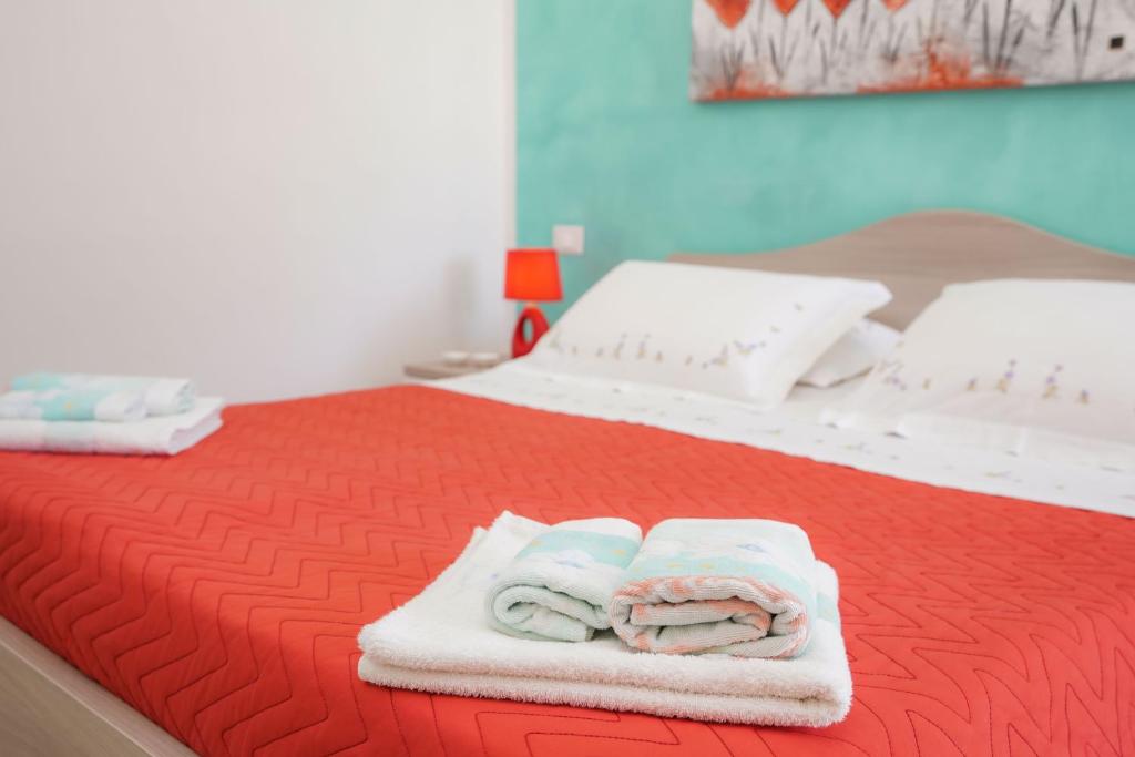 Postel nebo postele na pokoji v ubytování B&B San Giorgio