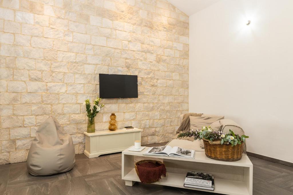 TV a/nebo společenská místnost v ubytování Loft Rooms I Cinque Mori