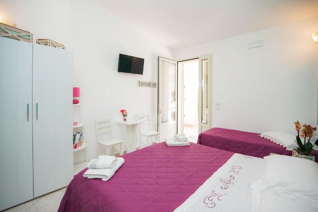 Postel nebo postele na pokoji v ubytování B&B San Giorgio