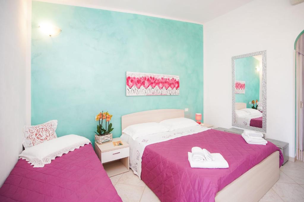Postel nebo postele na pokoji v ubytování B&B San Giorgio