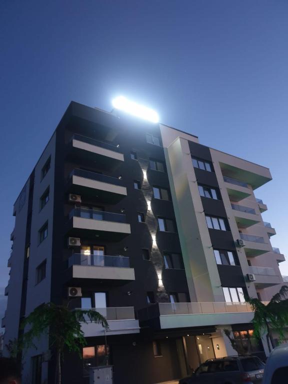 a building with a light on top of it at Sun up mamaia nord 2 in Năvodari