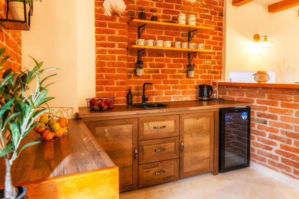 Kuchyň nebo kuchyňský kout v ubytování Holiday Home Prevolt