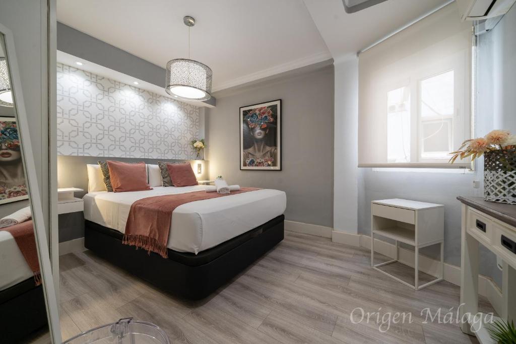 Posteľ alebo postele v izbe v ubytovaní Xpce Malaga SOHO