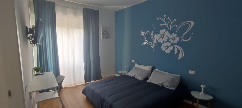 Postel nebo postele na pokoji v ubytování B&B camere fiori 8