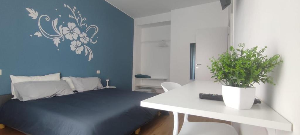 Postel nebo postele na pokoji v ubytování B&B camere fiori 8