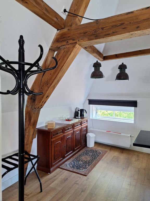Postel nebo postele na pokoji v ubytování B&B Lange Geer Delft