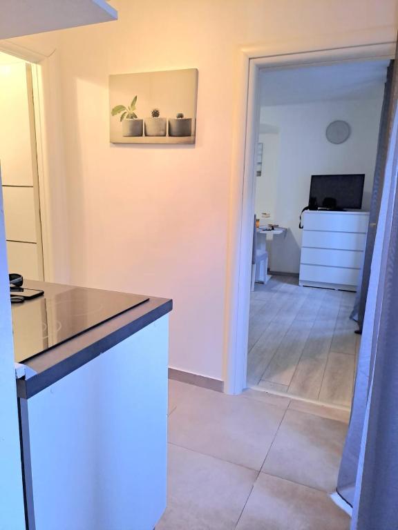 Kuchyňa alebo kuchynka v ubytovaní Studio apartment Lola