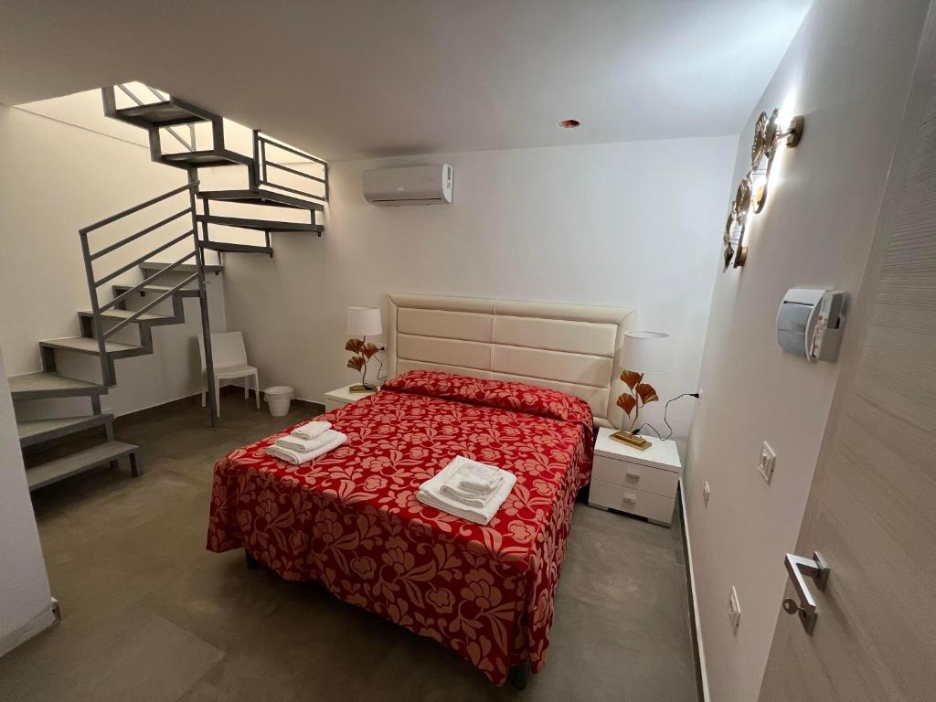 Postel nebo postele na pokoji v ubytování Le Castella B&B Restaurant