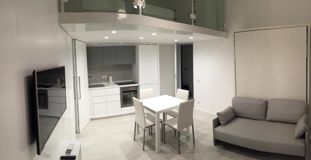 A kitchen or kitchenette at Duomo Inn