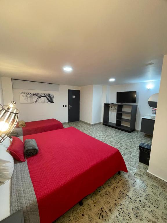 Postel nebo postele na pokoji v ubytování Hotel Ofix