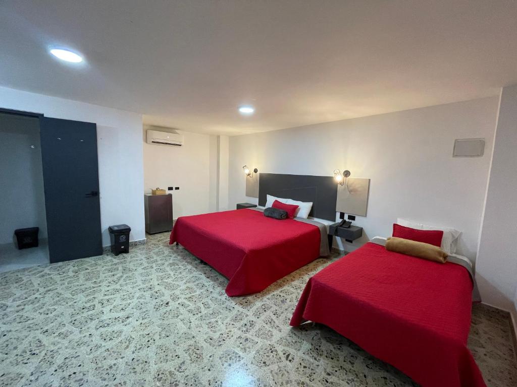 Postel nebo postele na pokoji v ubytování Hotel Ofix