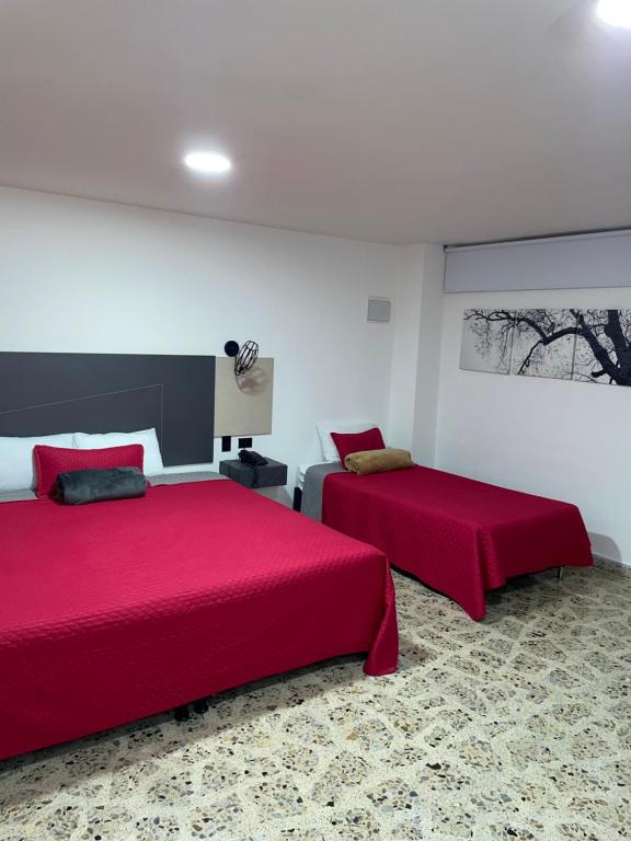 Postel nebo postele na pokoji v ubytování Hotel Ofix