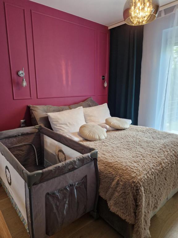 Giường trong phòng chung tại Green Terrace Big Family Apartment