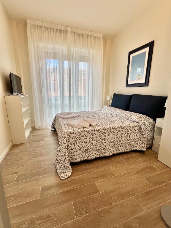 Postel nebo postele na pokoji v ubytování F&F Rooms
