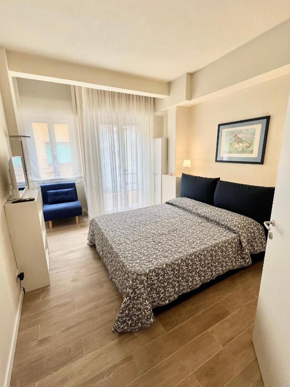 Postel nebo postele na pokoji v ubytování F&F Rooms