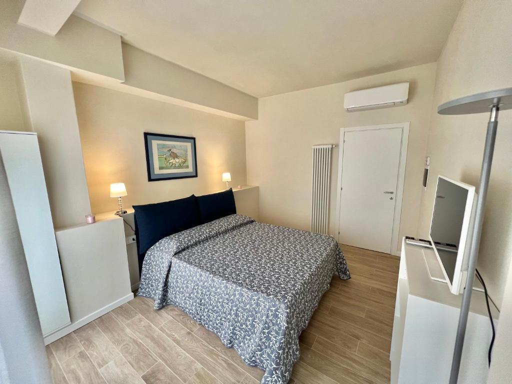 Postel nebo postele na pokoji v ubytování F&F Rooms