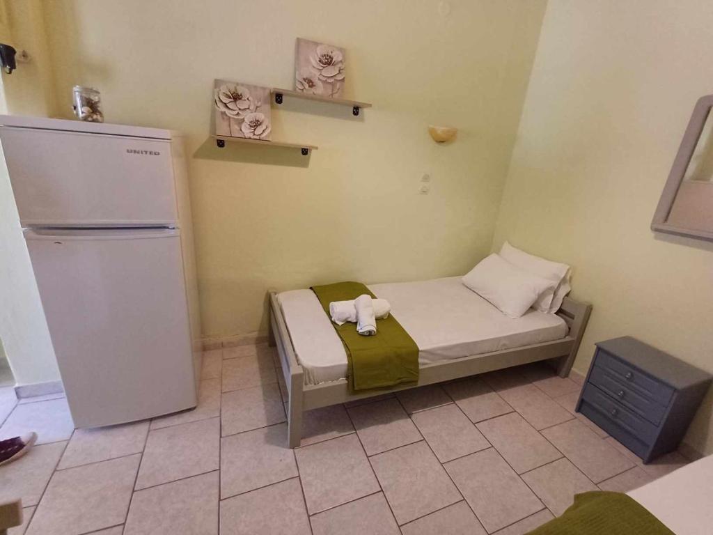 Postel nebo postele na pokoji v ubytování Ta Spitakia Olympiada