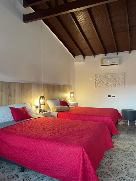Postel nebo postele na pokoji v ubytování Hotel Ofix