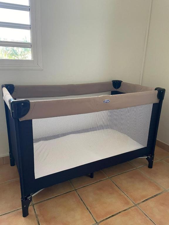 Postel nebo postele na pokoji v ubytování APPARTEMENT T3 "TI CAZE" Villa Bel Kay Nou