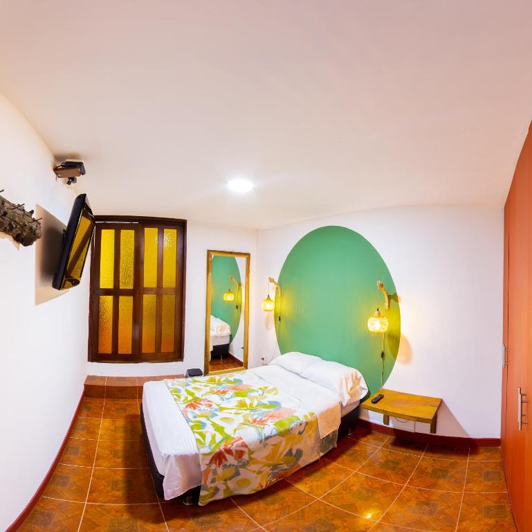 Postel nebo postele na pokoji v ubytování NOGAL SPA & HOSTEl