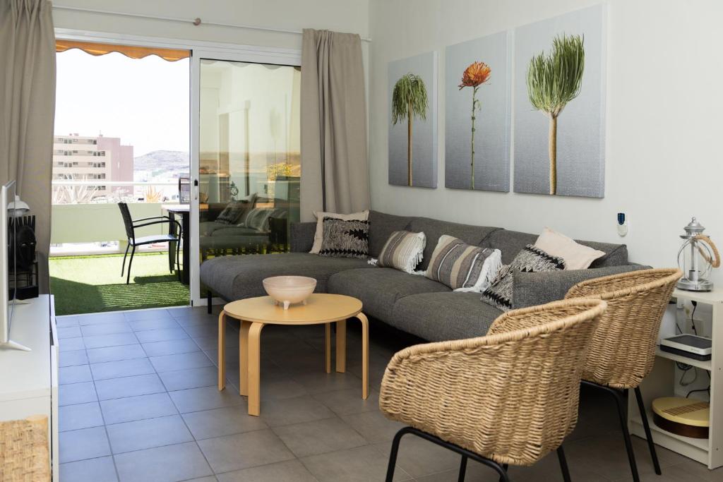 A seating area at Vistas al Mar junto a la Playa 3D