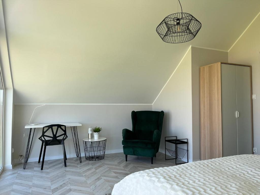 Postel nebo postele na pokoji v ubytování Tu jest pięknie- dom premium z ogrodowym spa