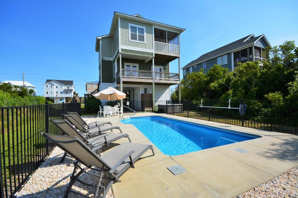 Bazén v ubytování Surfin' Pelican nebo v jeho okolí