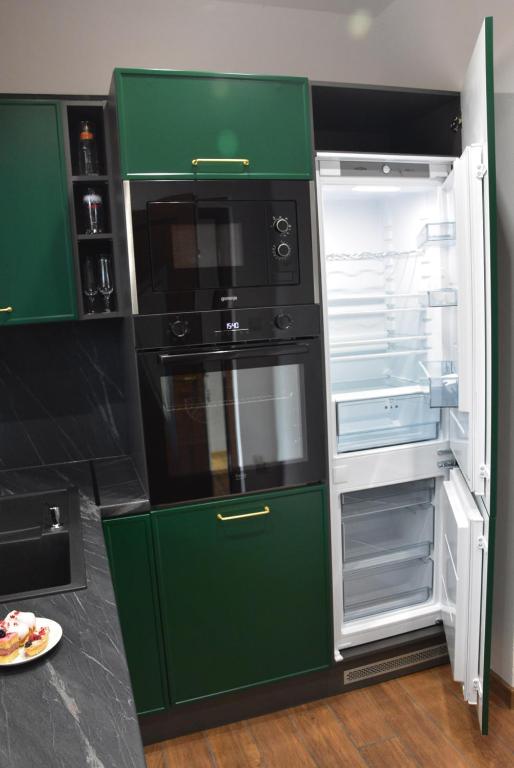 Kuchyň nebo kuchyňský kout v ubytování Apartmány Žakovce & SPA
