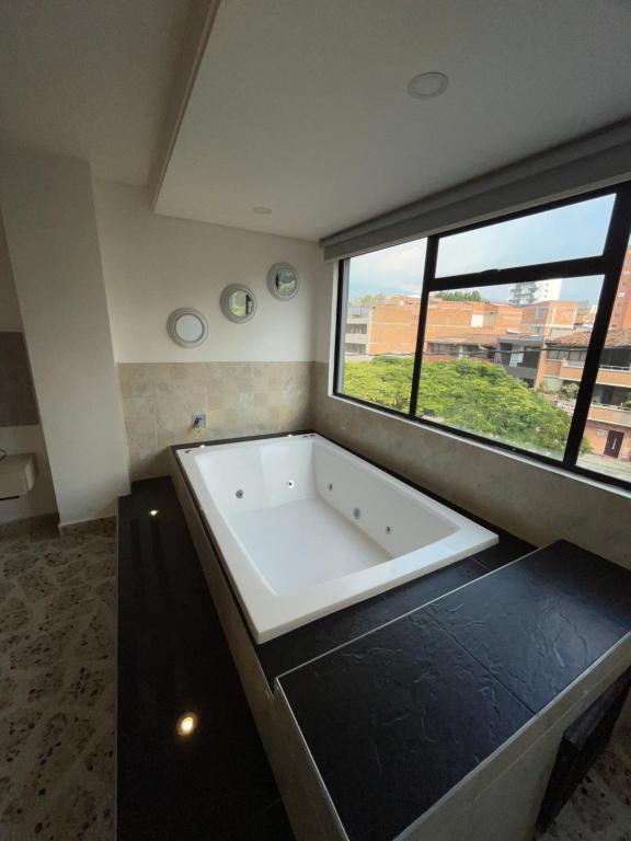 Postel nebo postele na pokoji v ubytování Hotel Ofix
