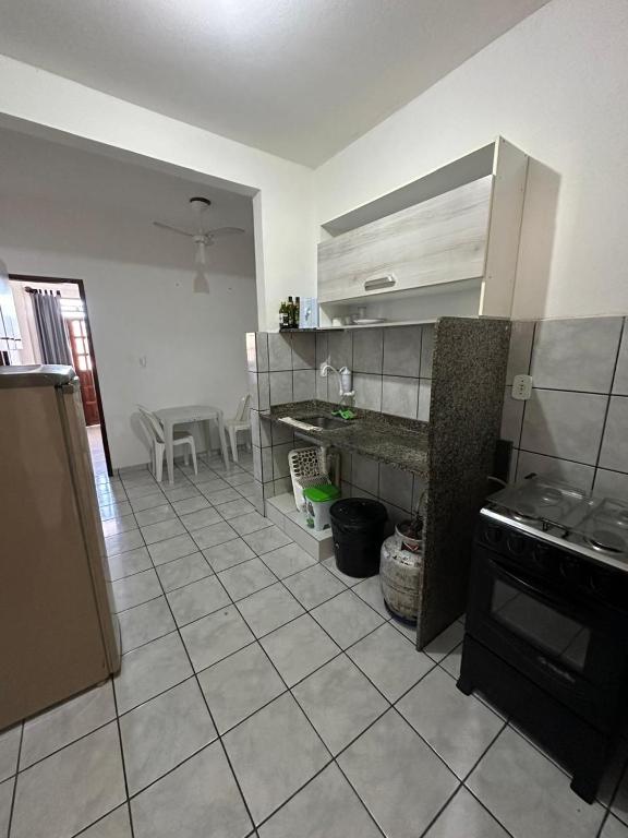 Kuchyň nebo kuchyňský kout v ubytování Apartamentos completos no centro - vista mar