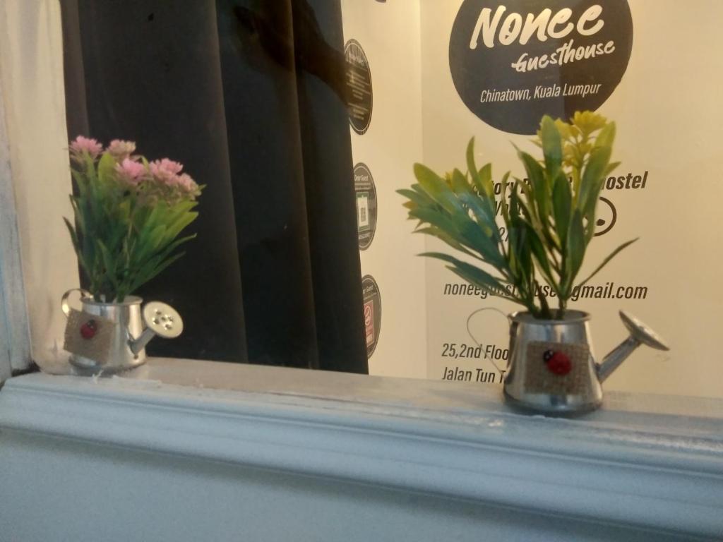 Majutusasutuses Nonee Guesthouse olev sertifikaat, autasu, silt või muu dokument