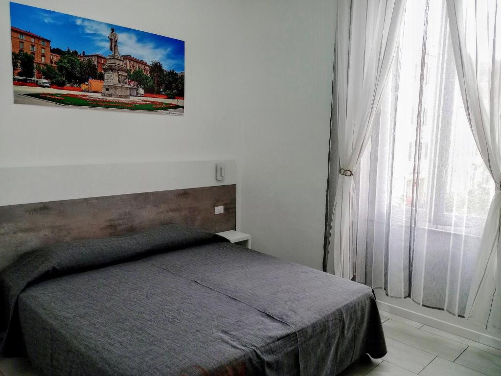 Postel nebo postele na pokoji v ubytování La Piazza