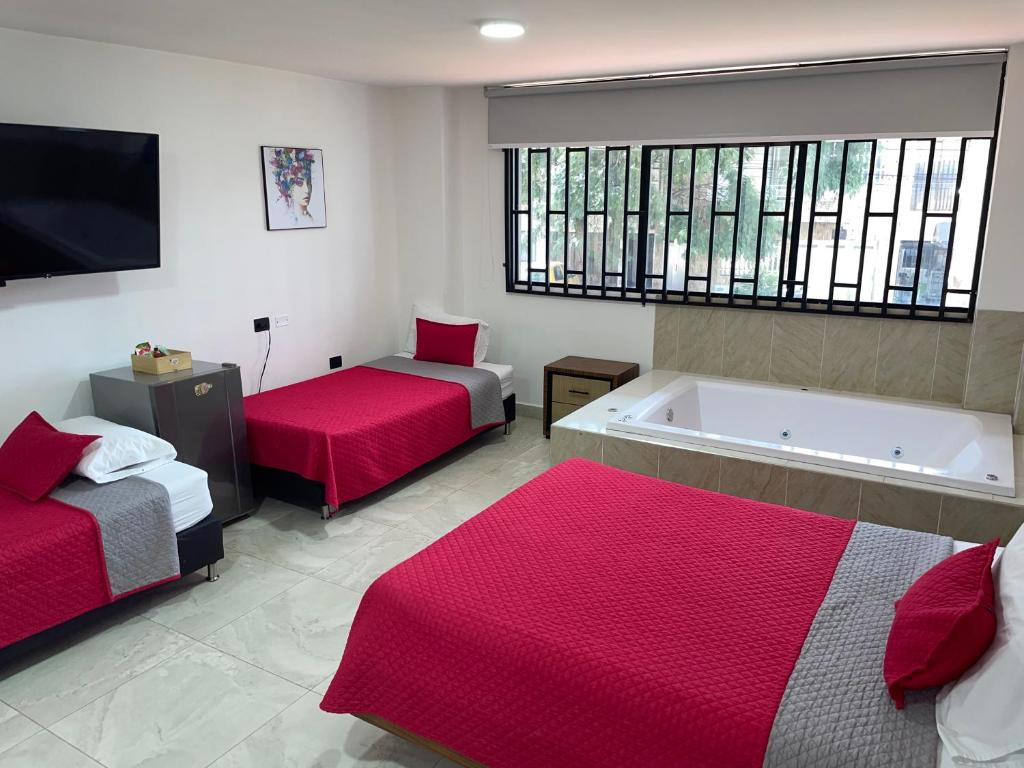 Hotel Ofix - Habitacion Deluxe Cuadruple Con Bañera